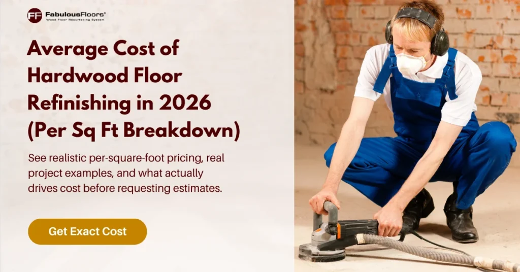 Professional contractor sanding hardwood floor during refinishing project