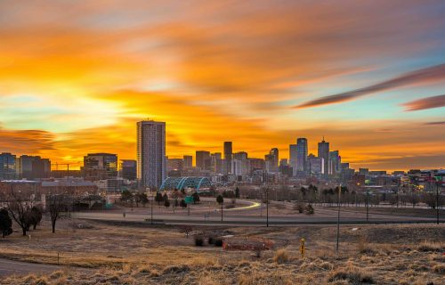 Denver, Colorado, USA downtown city skyline at dawn.